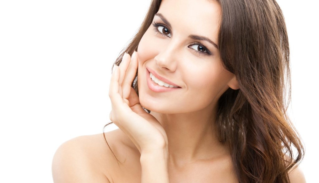 Portrait of beautiful young happy smiling woman